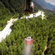 Illustration for article titled This Helicopter Bambi Bucket Demo In The Alps Is Gorgeous